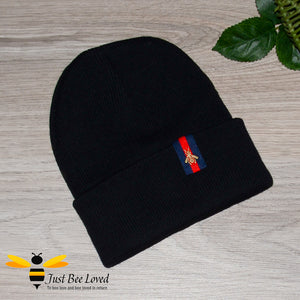 Black Ribbed knit beanie skull cap featuring an embroidered bee tab motif
