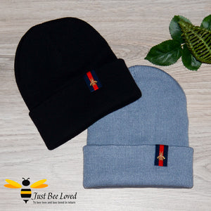 black and grey ribbed knit beanie skull caps featuring an embroidered bee tab motif