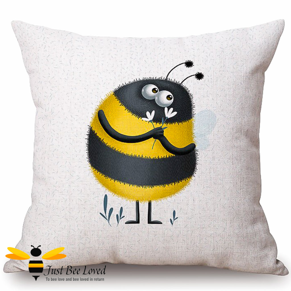 Natural beige scatter cushion featuring a colourful bumblebee character holding daisy flowers.
