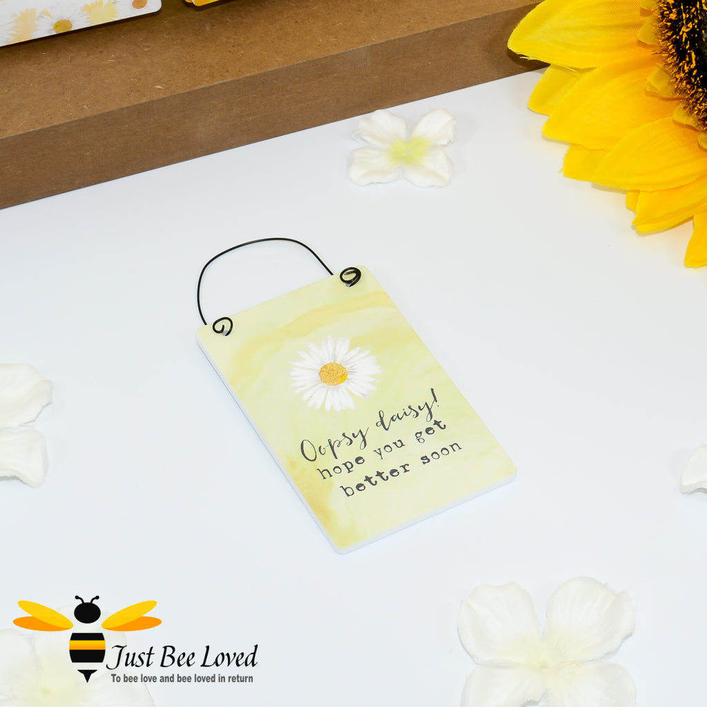 Wooden mini sign card with daisy illustration and 'Oopsy Daisy! Hope you get better soon' message.