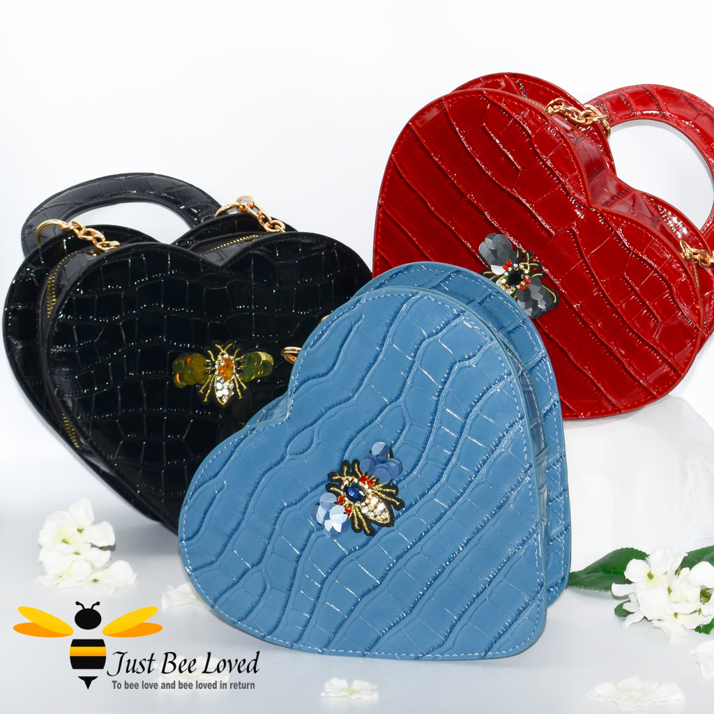 3 faux patent leather heart-shaped handbag featuring embossed crocodile skin, with bee embellishment.