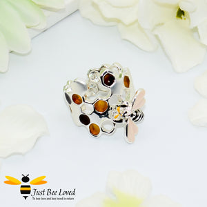 silver colour ring enamelled filled honeycomb to look like pollen with a honeybee.  
