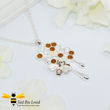 Load image into Gallery viewer, silver plated pendant necklaces each featuring golden honey drips, enamelled filled honeycomb to look like pollen with a honeybee.  