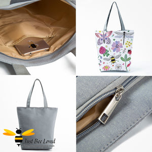 eco-friendly shopper tote bag featuring a colourful full frontal print design of pollinating insects amongst a floral display