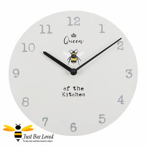 Large wooden wall clock with bumblebee and crown with text "queen bee of the kitchen".