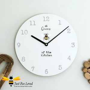 Large wooden wall clock with bumblebee and crown with text "queen bee of the kitchen".