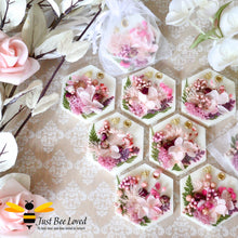 Load image into Gallery viewer, Hexagon shaped scented botanical wax tablets decorated with pink florals, gold bee embellishment, perfumed with essential oils