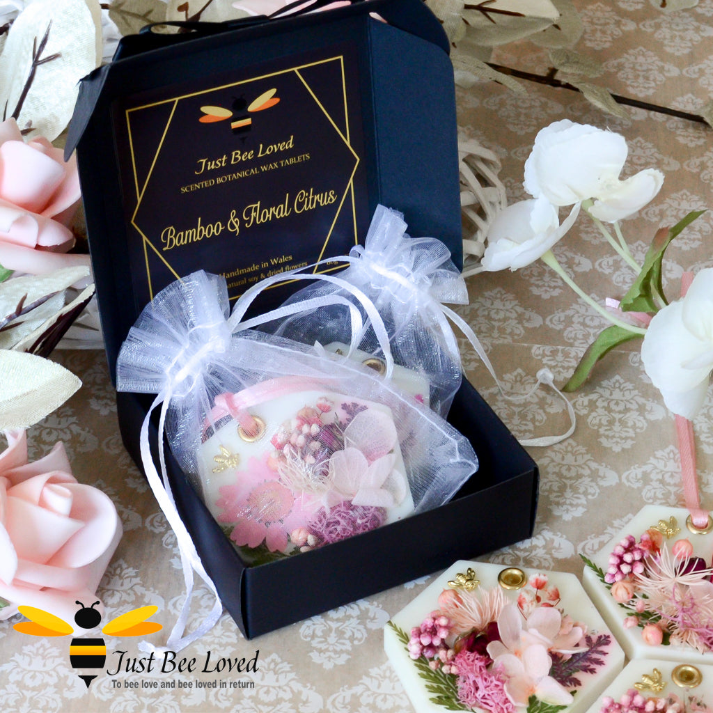 Gift box set of Hexagon shaped scented botanical wax tablets decorated with pink florals, gold bee embellishment, perfumed with essential oils