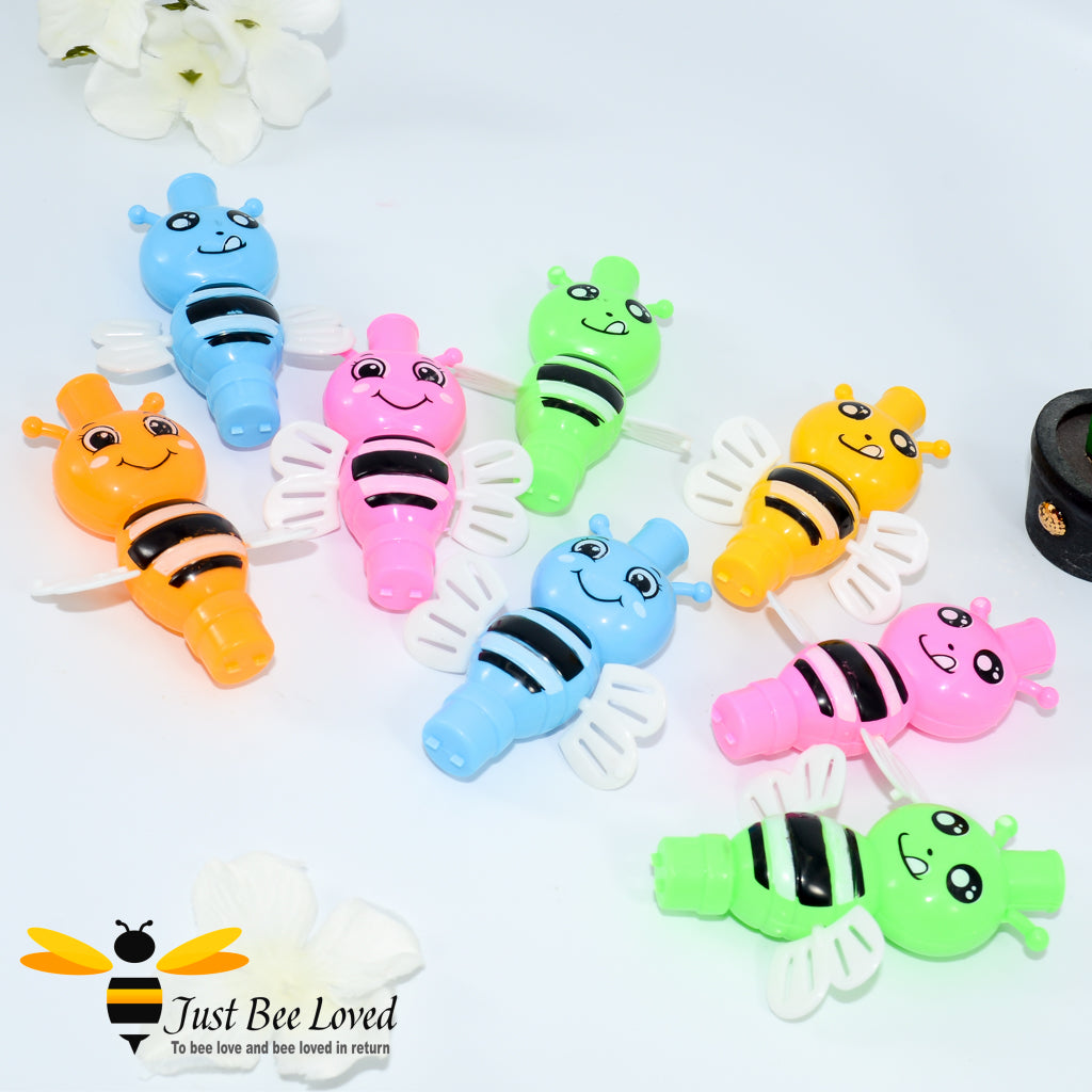 8 spinning party blower bee whistle toys