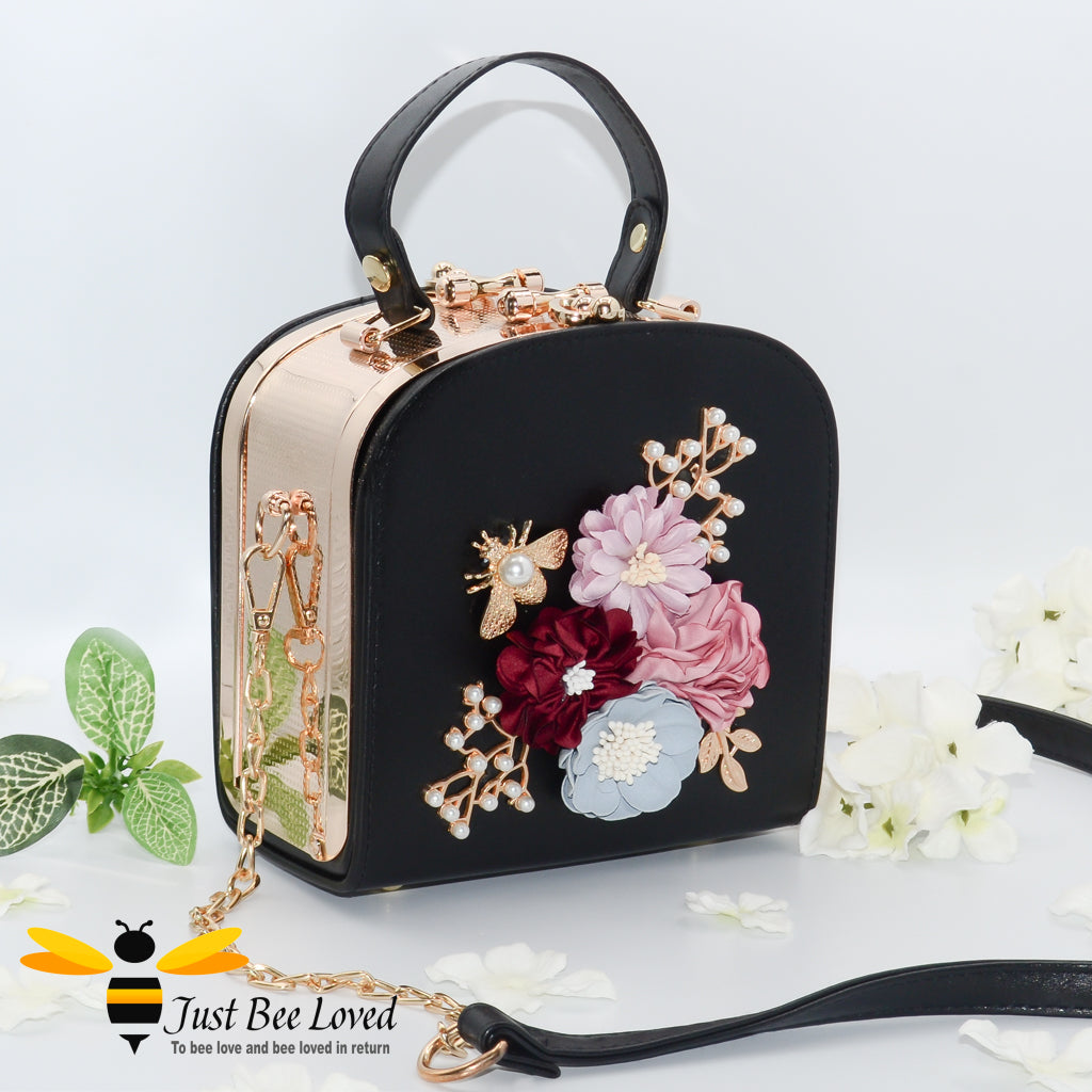 hand-crafted 3D embellished square metal handbag featuring a bouquet of flowers, golden leaves with a pearlised bee in black