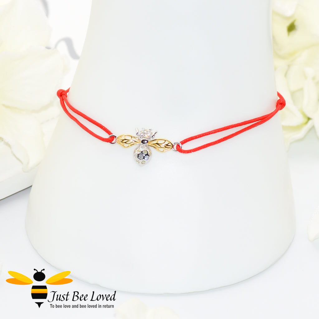 friendship rope bracelet featuring an interlocked sterling silver bee with charm