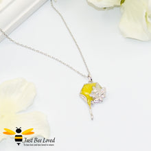 Load image into Gallery viewer, sterling silver necklace featuring a honeycomb shaped pendant with honey drip embellished with a silver bee