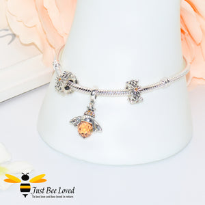 Sterling Silver Snake bracelet with two daisy charms and queen bee pendant with orange czech zirconia crystals