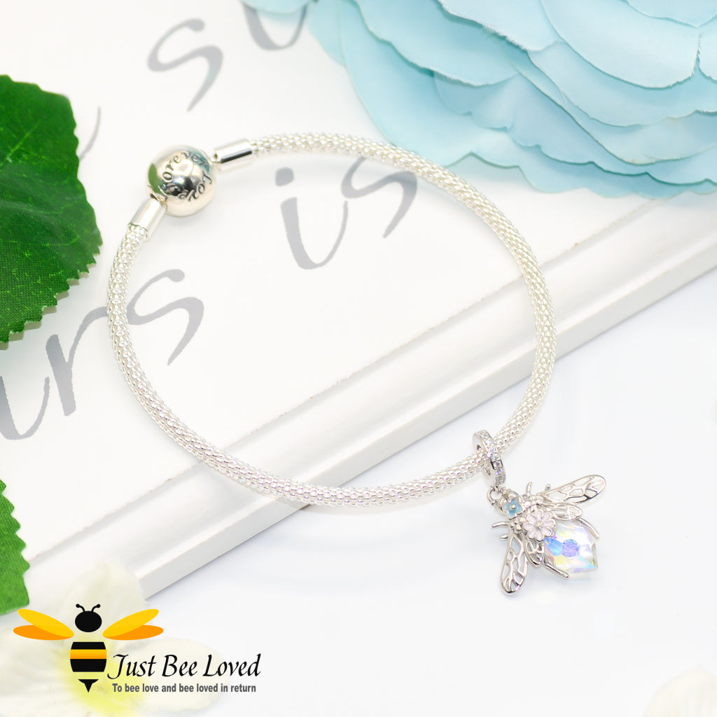 sterling silver bracelet engraved with forever love with a crystal sterling silver bee charm.
