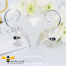 Load image into Gallery viewer, sterling silver spiral drop earrings feature a 3D honey bee