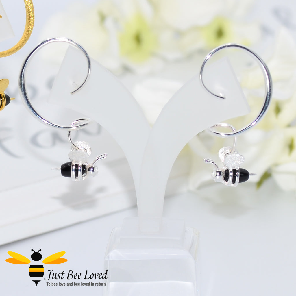 sterling silver spiral drop earrings feature a 3D honey bee