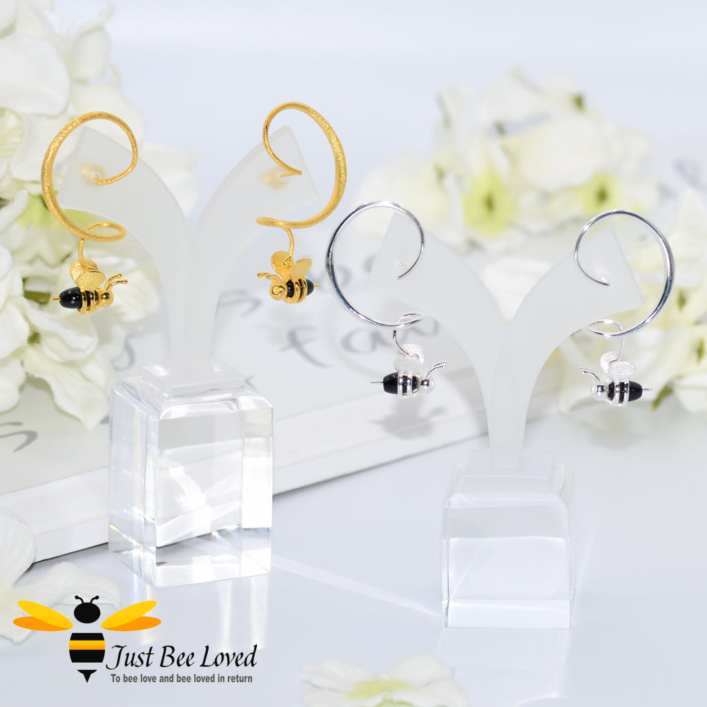 sterling silver spiral drop earrings feature a 3D honey bee