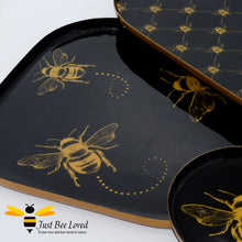 Load image into Gallery viewer, Temerity Jones black and gold 3 piece plateau tray set decorated with gold bumblebees