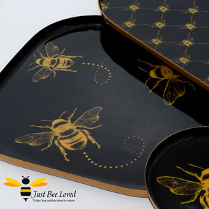 Temerity Jones black and gold 3 piece plateau tray set decorated with gold bumblebees