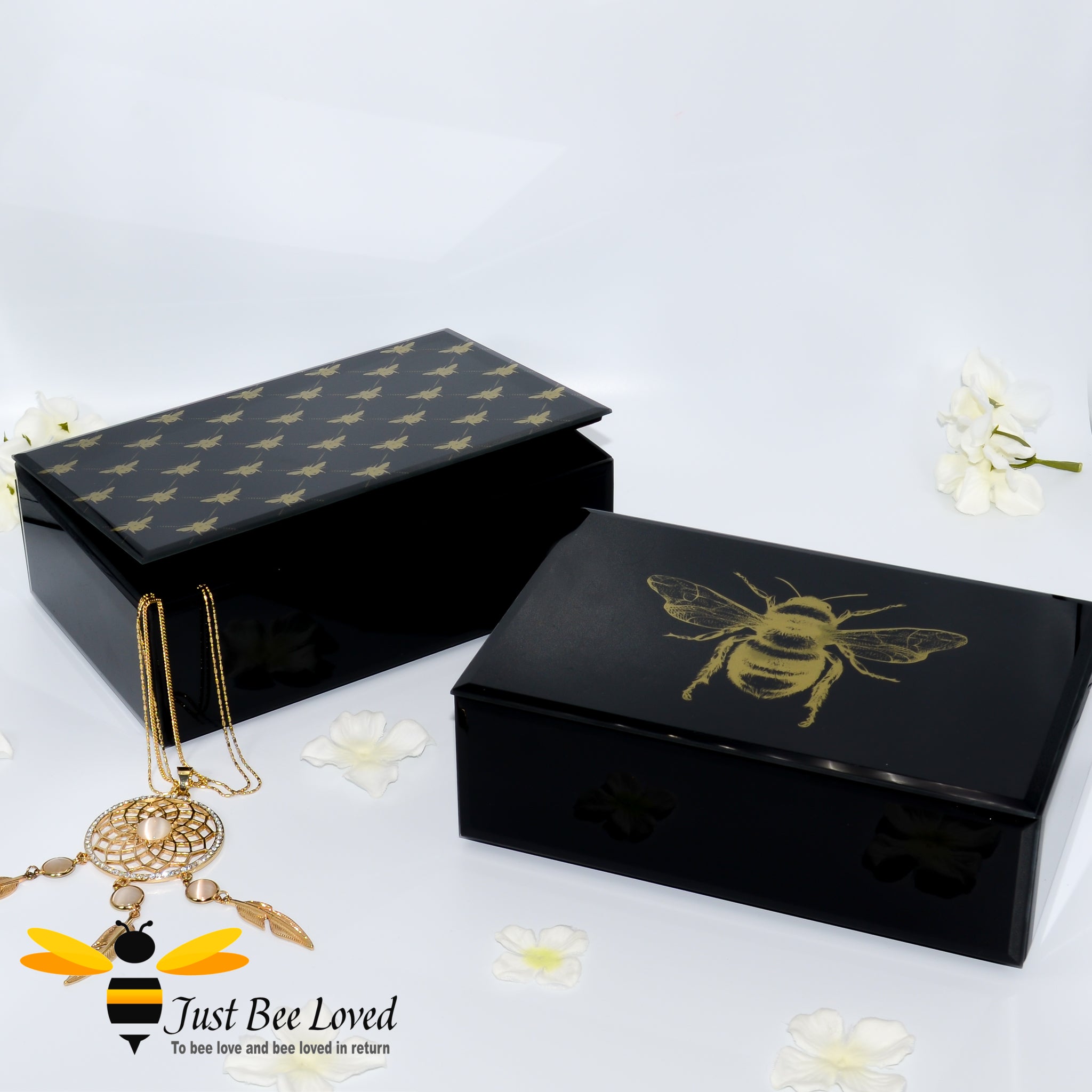 Black glass mirrored jewellery boxes featuring gold bumblebees decoration from Temerity Jones London Bees collection