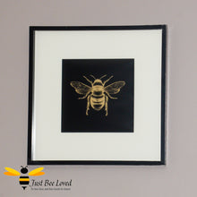 Load image into Gallery viewer, Temerity Jones Framed and mounted gold bumblebee on black backdrop wall art