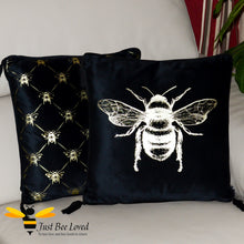 Load image into Gallery viewer, Pair of black velvet plush scatter cushions by Temerity Jones with gold bees design