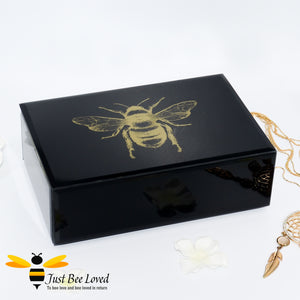 Black glass mirrored jewellery boxes featuring gold bumblebees decoration from Temerity Jones London Bees collection