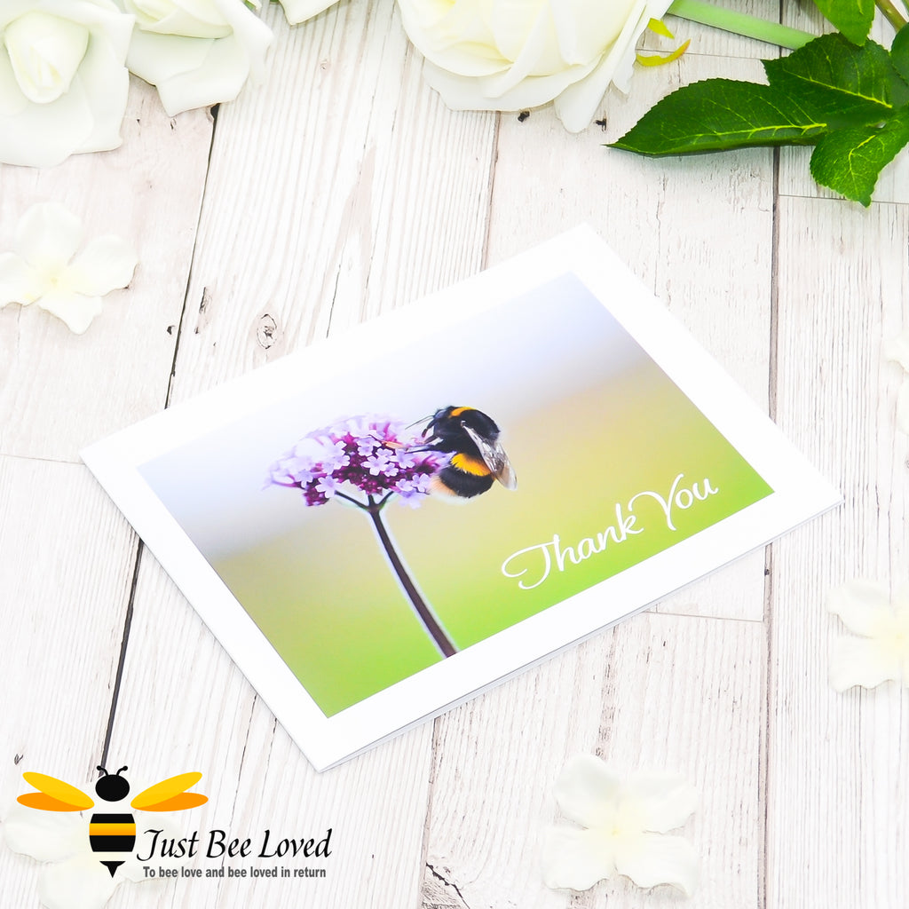 A photographic greeting card featuring a portrait of a bumblebee on a purpletop verbena plant, with a 'Thank You' message.