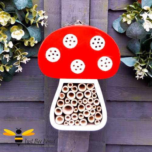 wooden Toadstool shaped bee and insect hotel house in white and red