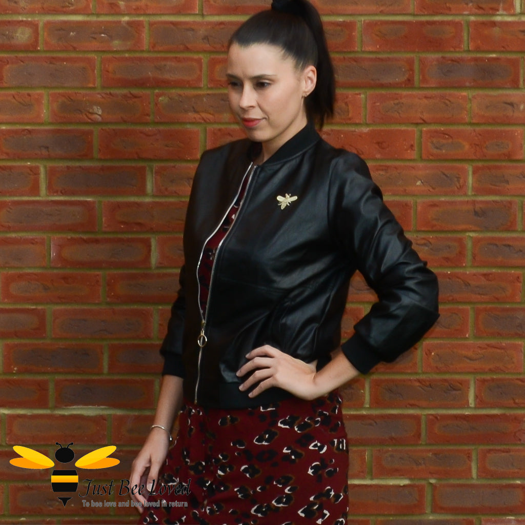 Women's faux vegan friendly leather black biker bomber baseball jacket featuring bee embroidery detailing