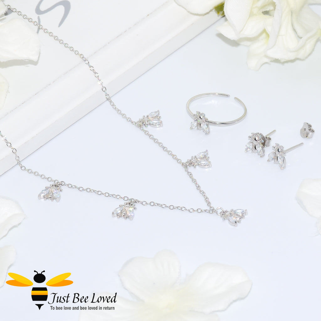 sterling silver jewellery set featuring a necklace detailed with 5 white crystal bees, matching bee stud earrings and ring.