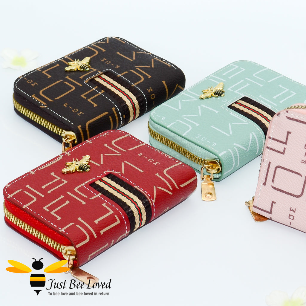 A collection of RFID blocking card holder wallets with bee embellishments, displayed in brown, red, green, and pink colours.