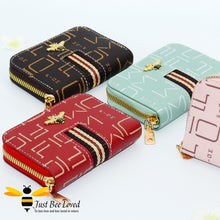 Load image into Gallery viewer,  RFID card holder wallet with bold inter-linking letter pattern with central co-ordinating band and gold bee embellishment