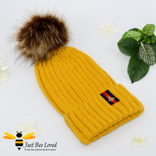Load image into Gallery viewer, Yellow ribbed knit hat featuring a faux fur pom pom with embroidered bumblebee tab on rim
