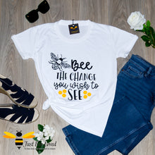 Load image into Gallery viewer, Women&#39;s white cotton crew neck T-shirt with Mahatma Gandhi quote &quot;Be the change you want to see&quot; with a bumblebee design