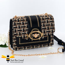 Load image into Gallery viewer, Woven faux leather handbag with gold bee decoration in black colour
