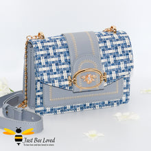 Load image into Gallery viewer, Woven faux leather handbag with gold bee decoration in blue colour