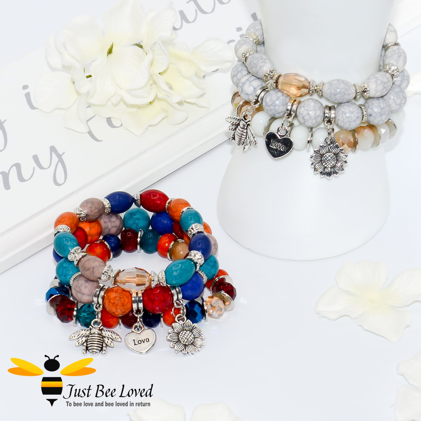 Bohemian gypsy styled 3-layer stack beaded bracelet featuring bee, love-heart and sunflower charms