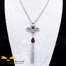 Load image into Gallery viewer, silver colour necklace with a bee pendant, purple crystal and tassel