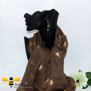ladies scarf featuring metallic rose gold bumblebee print in brown, gift boxed with crystal rose gold bee brooch. 