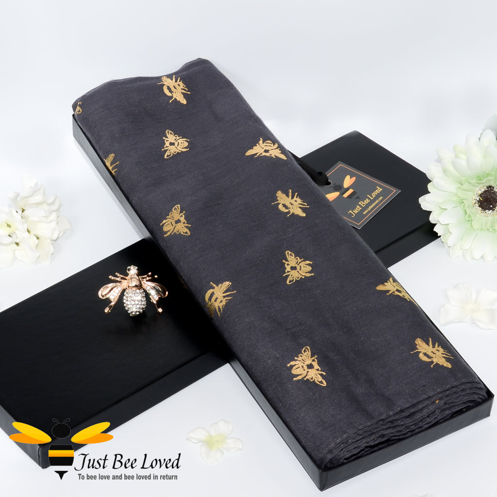 ladies dark grey lightweight scarf gold bee print, gift boxed with gold bee brooch. 