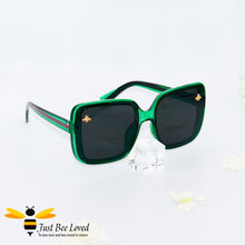 Load image into Gallery viewer, oversized retro styled square sunglasses featuring sweet gold bees on each lens in dark green colour