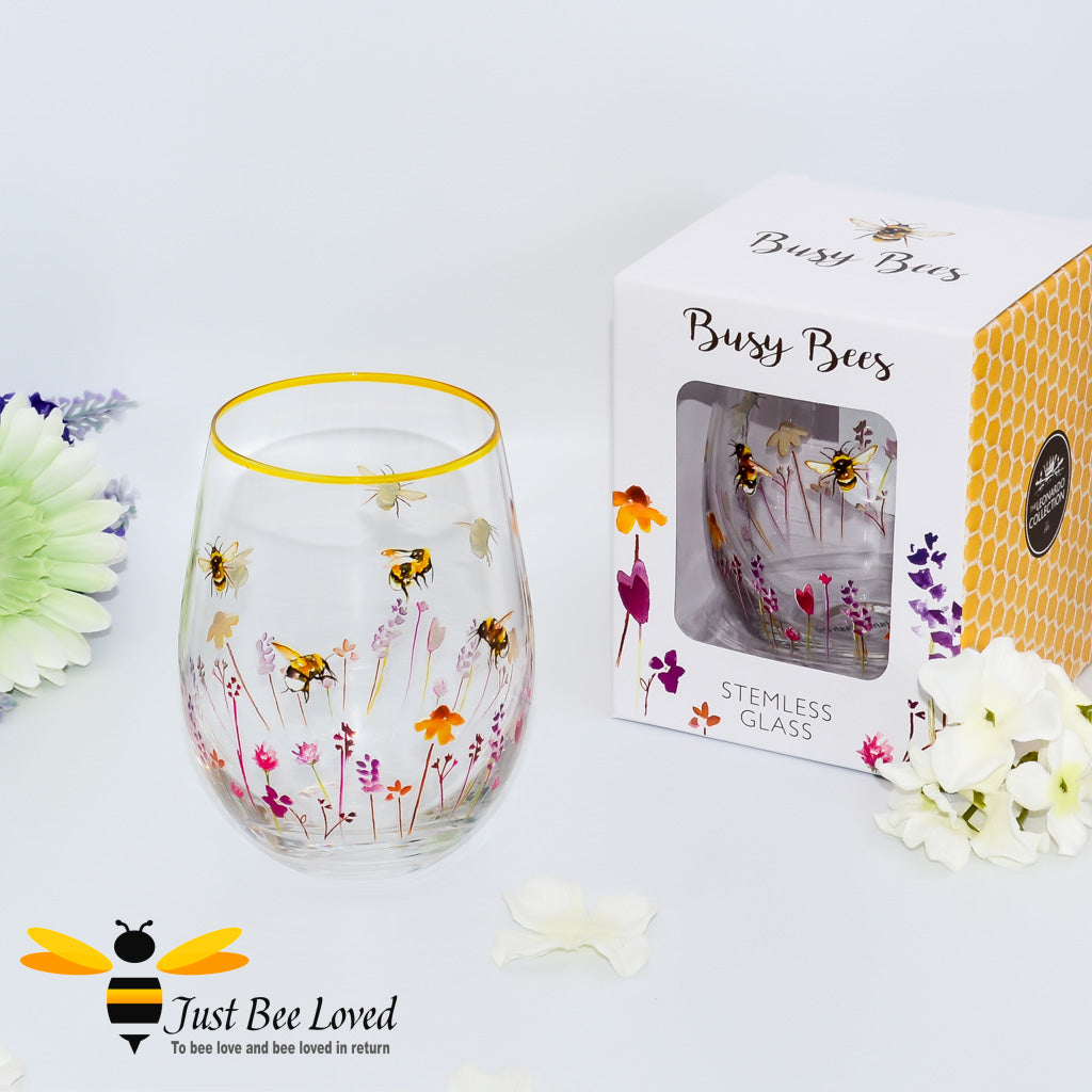 Jennifer Rose busy bees stemless wine glass with gold rim.