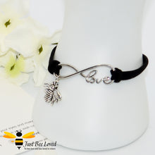 Load image into Gallery viewer, Handmade faux black suede leather bracelet featuring a bee charm with love link