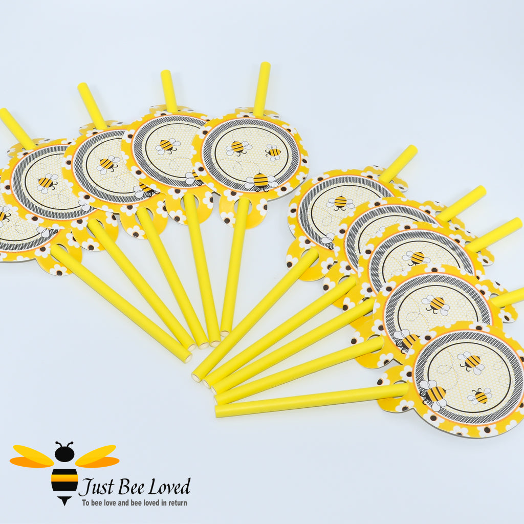 Bee themed yellow party paper drinking straws.