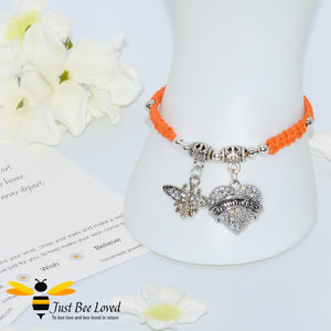 handmade Shamballa wish bracelet featuring a bee charm and love heart engraved with "Daughter" in orange colour