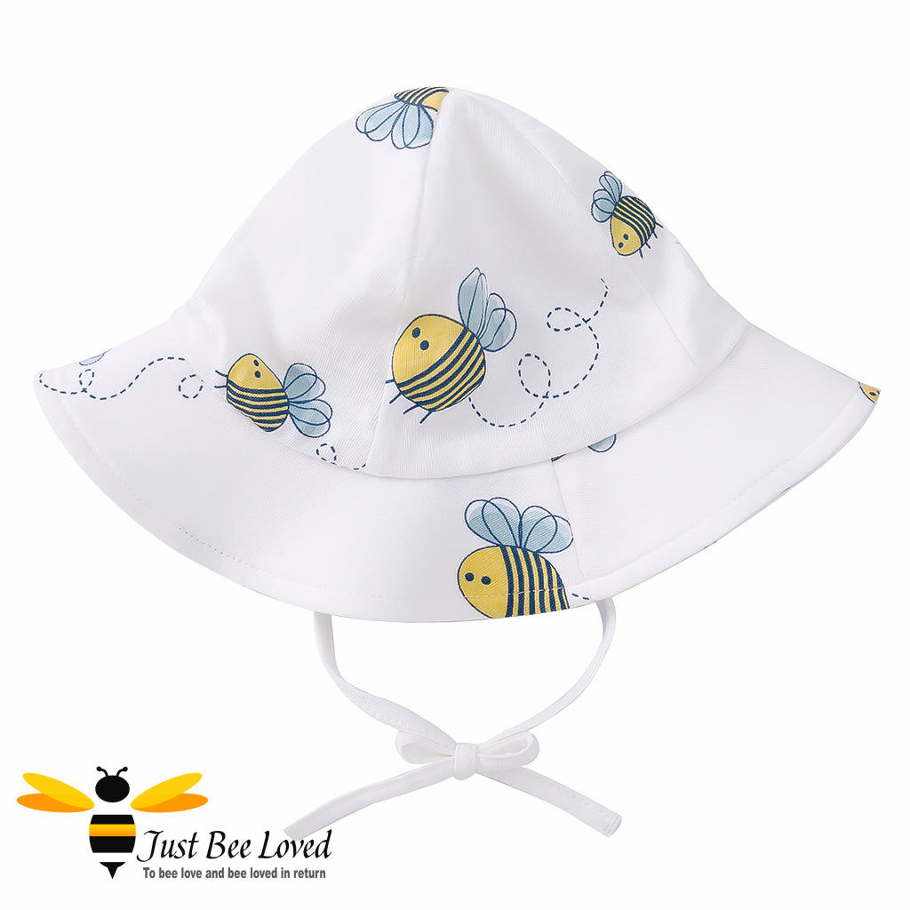 Baby Girls ivory floppy sun hat featuring an all over pretty little bees print.