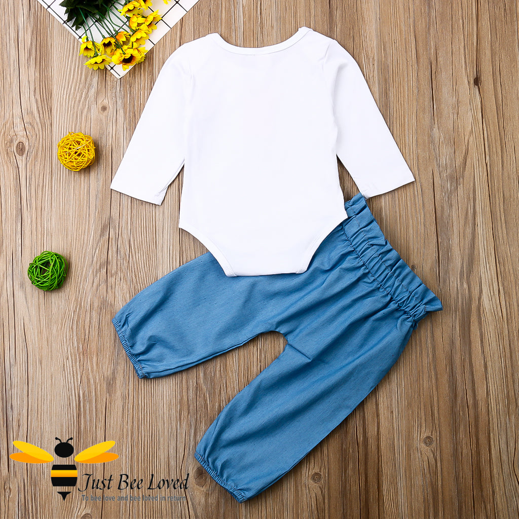2-piece set featuring a white bodysuit with bees and flowers and the message "bee you" matched with coordinating harem styled blue pants.  
