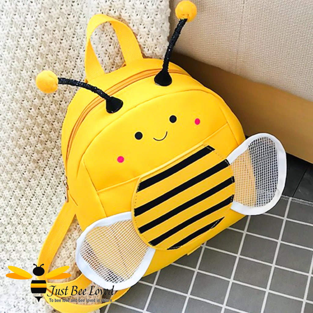 Just Bee Loved Children's Safety Harness Bumble Bee Backpack with cute antennae, white mesh wings and smiley bee face in colour yellow with black stripes