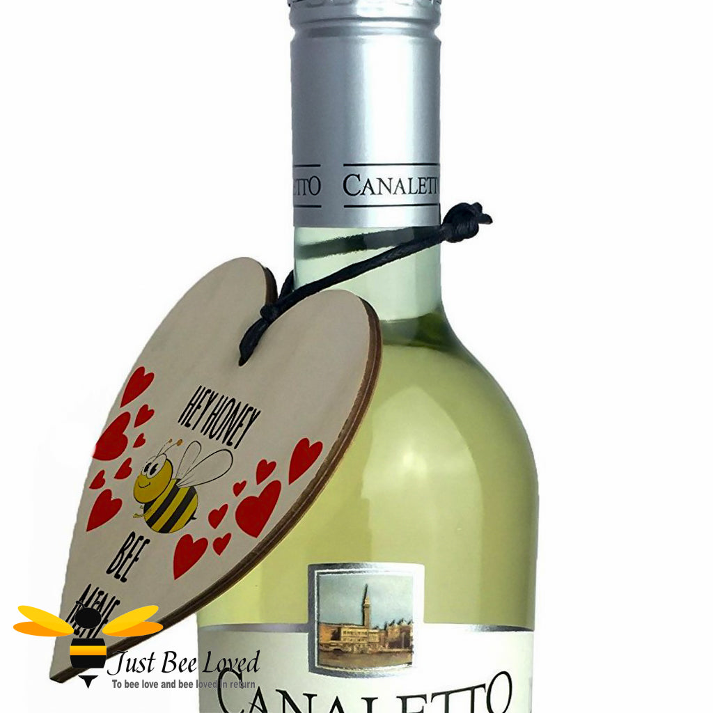 Heart shaped wooden hanging mini plaque with 'hey honey bee mine' text, a smiling bee and red hearts.